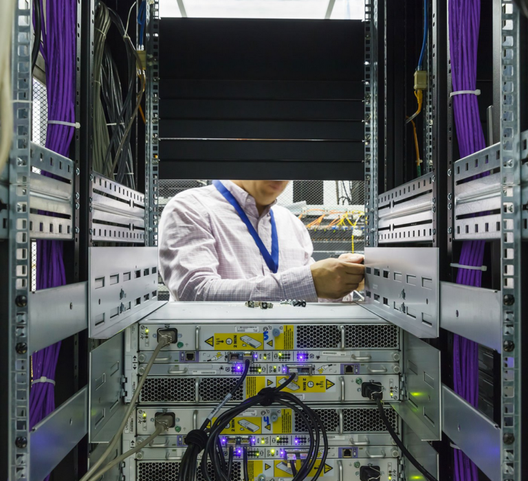 Smart hands technician in San Jose installing storage nodes.
